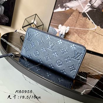 Louis Vuitton Monogram Empreinte Zipper wallet