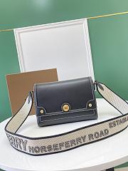 	 Bagsaaa Burberry Note Topstitched Crossbody Bag In Black - 1
