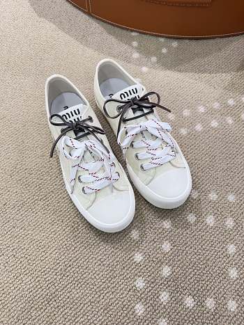 Bagsaaa Miu Miu Washed denim sneakers ivory