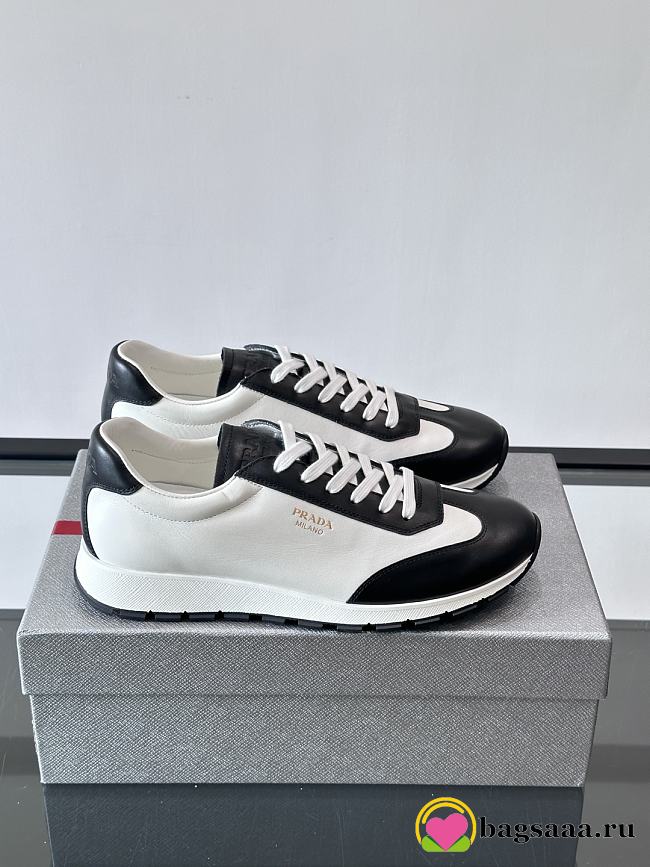 Bagsaaa Prada Downtown low-top sneakers in white and black - 1