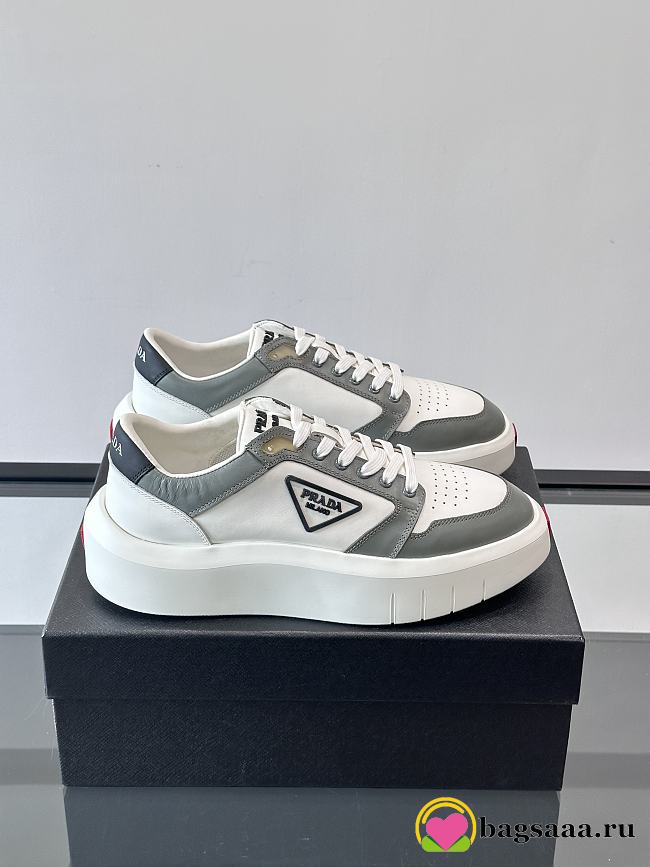 Bagsaaa Prada Downtown leather sneakers in a white and gray colorway - 1