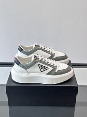 Bagsaaa Prada Downtown leather sneakers in a white and gray colorway - 1