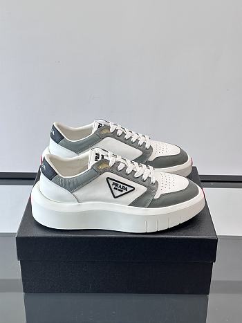 Bagsaaa Prada Downtown leather sneakers in a white and gray colorway