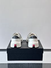 Bagsaaa Prada Downtown leather sneakers in a white and gray colorway - 3