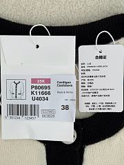 Bagsaaa Chanel cardigan in a white knit with black trim and pearl buttons - 2