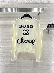 Bagsaaa Chanel knit sweater in white with a black logo  - 1