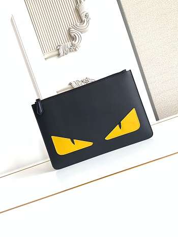 Bagsaaa Fendi Monster Eyes leather clutch bag in black with yellow - 30cm