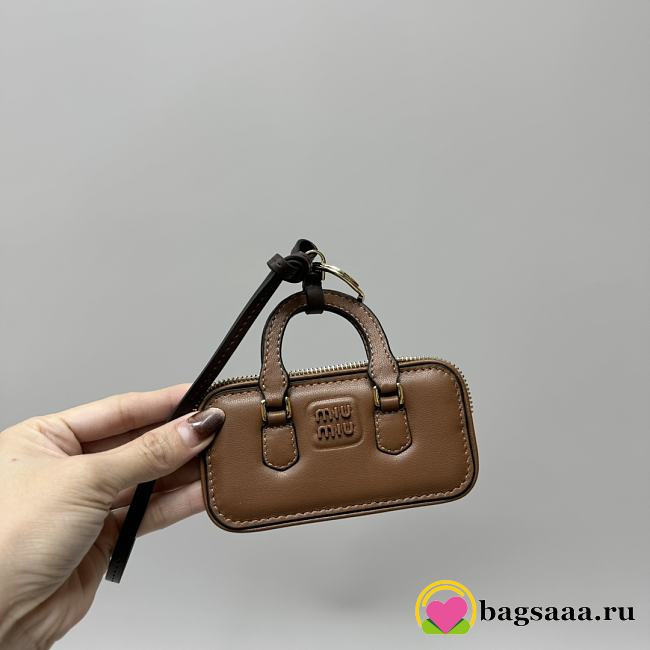Bagsaaa Miu Miu Trick Arcadie leather keychain charm in a brown - 1