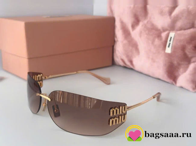 Bagsaaa Miu Miu rimless sunglasses feature gold-tone metal frames - 1